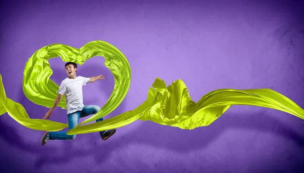 Young man Dancing With Fabric — Stock Photo, Image