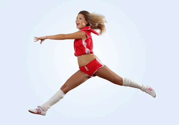 Cheerleader girl jumping — Stock Photo, Image