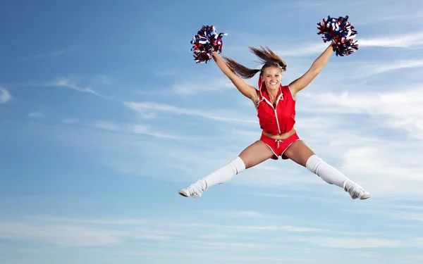 Unga kvinnliga cheerleader — Stockfoto