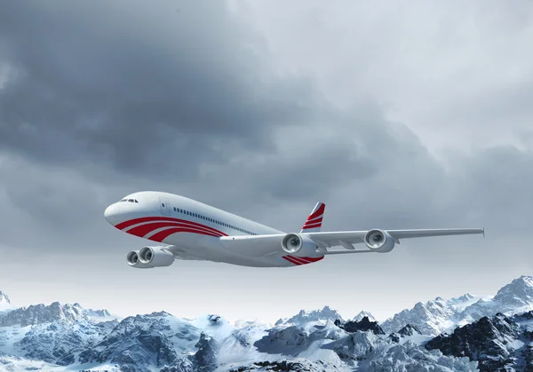 Witte passagiersvliegtuig boven de bergen — Stockfoto