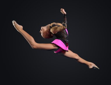 jimnastikçi elbise poz içinde genç bir kadın