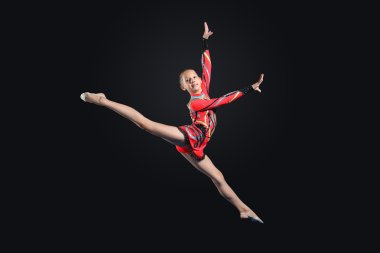 jimnastikçi elbise poz içinde genç bir kadın