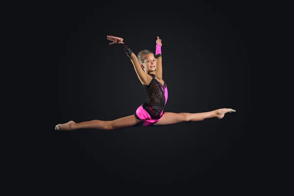 Young woman in gymnast suit posing — Stock Photo, Image