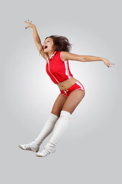 Young female dancer against white background — Stock Photo, Image