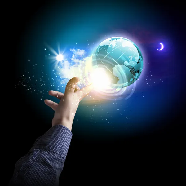 Hand touching the earth — Stock Photo, Image