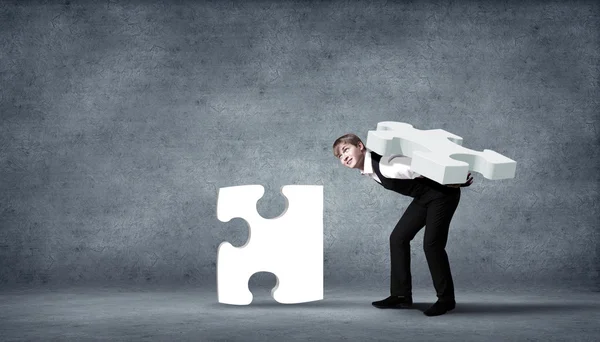Piece of puzzle and business persons — Stock Photo, Image