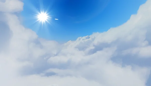 Blå himmel och sol. — Stockfoto