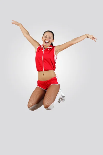 Young female dancer against white background — Stock Photo, Image