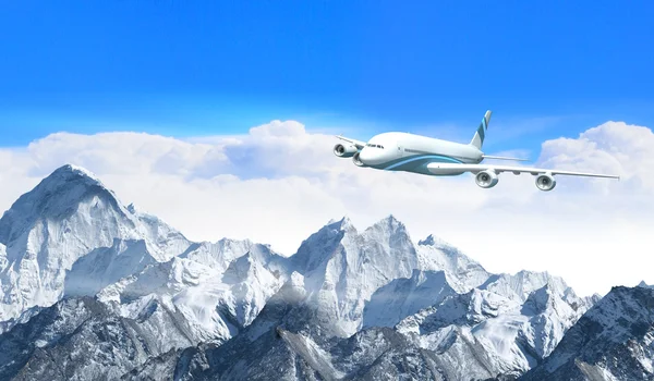 White passenger plane above the mountains — Stock Photo, Image