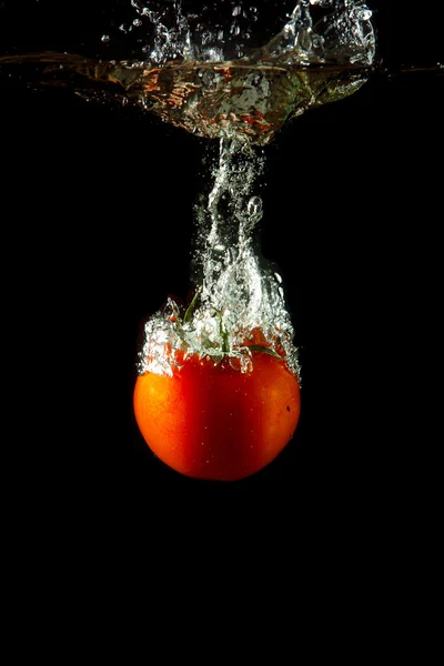 Fresh tomato under water — Stock Photo, Image