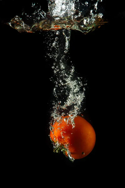 Fresh tomato under water — Stock Photo, Image