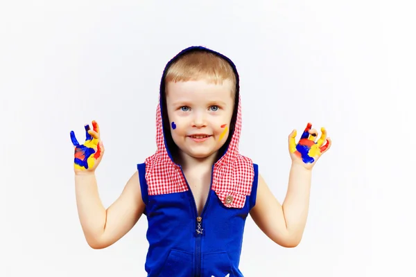 Bambino felice con vernice sulle mani — Foto Stock