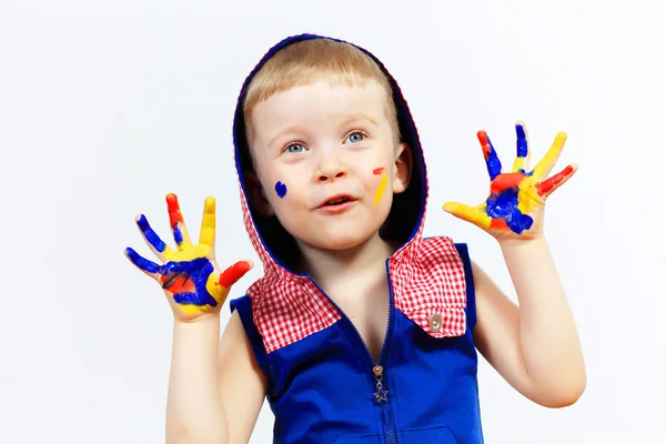 Happy child with paint on the hands — Stock Photo, Image