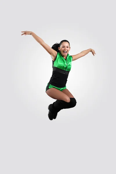 Young female dancer against white background — Stock Photo, Image