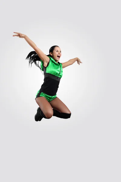 Young female dancer against white background — Stock Photo, Image