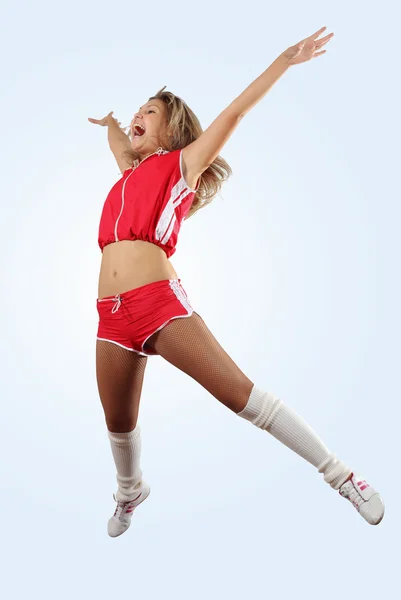 Cheerleader tjej hoppning — Stockfoto