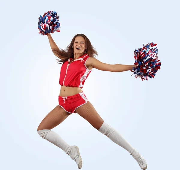 Dziewczyna cheerleaderka, skoki — Zdjęcie stockowe