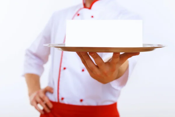 Cucinare tenendo un vassoio vuoto — Foto Stock