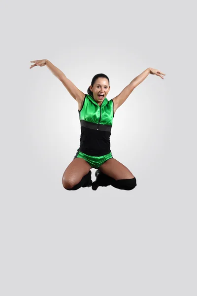 Young female dancer against white background — Stock Photo, Image