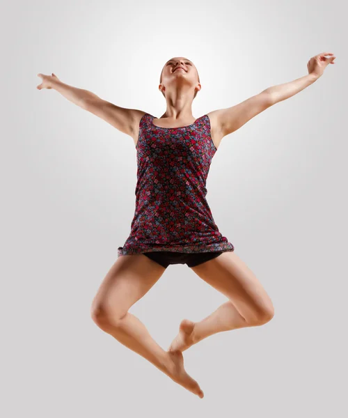 Girl in color dress dancing — Stock Photo, Image