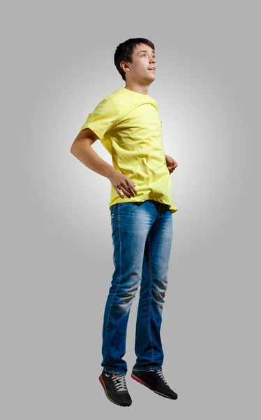 Young man dancing and jumping — Stock Photo, Image