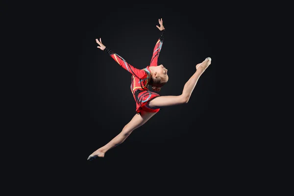 Jeune femme en costume de gymnaste posant — Photo