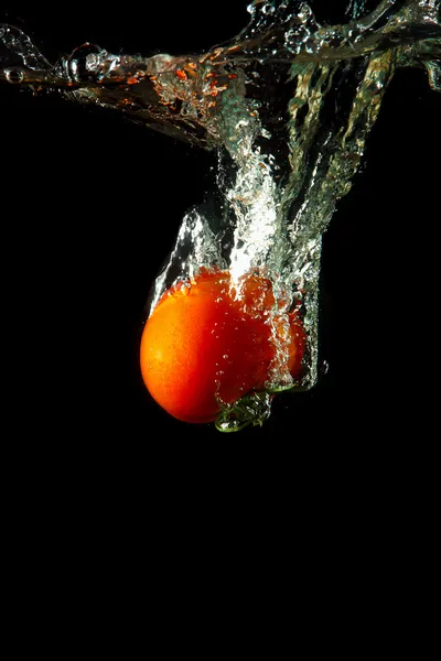 Fresh tomato under water — Stock Photo, Image