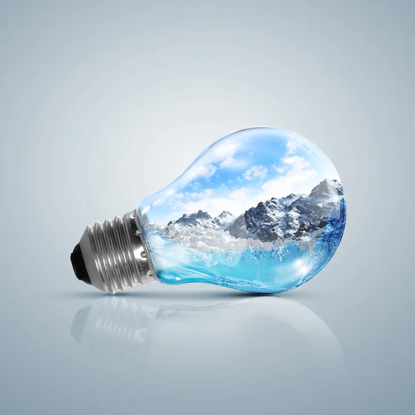 Lamp bulb with clean nature symbol inside — Stock Photo, Image