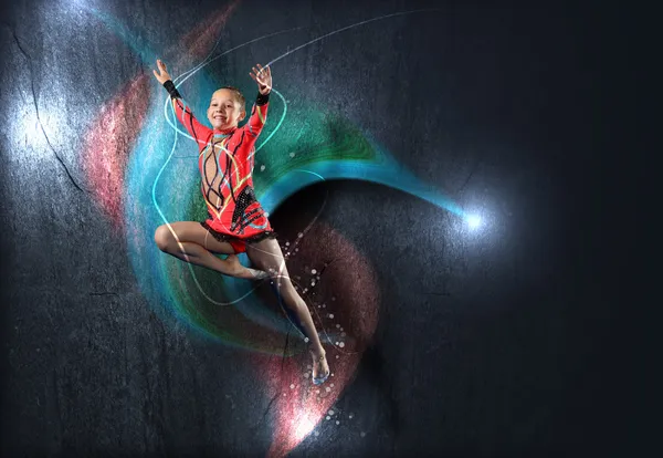 Young woman in gymnast suit posing — Stock Photo, Image