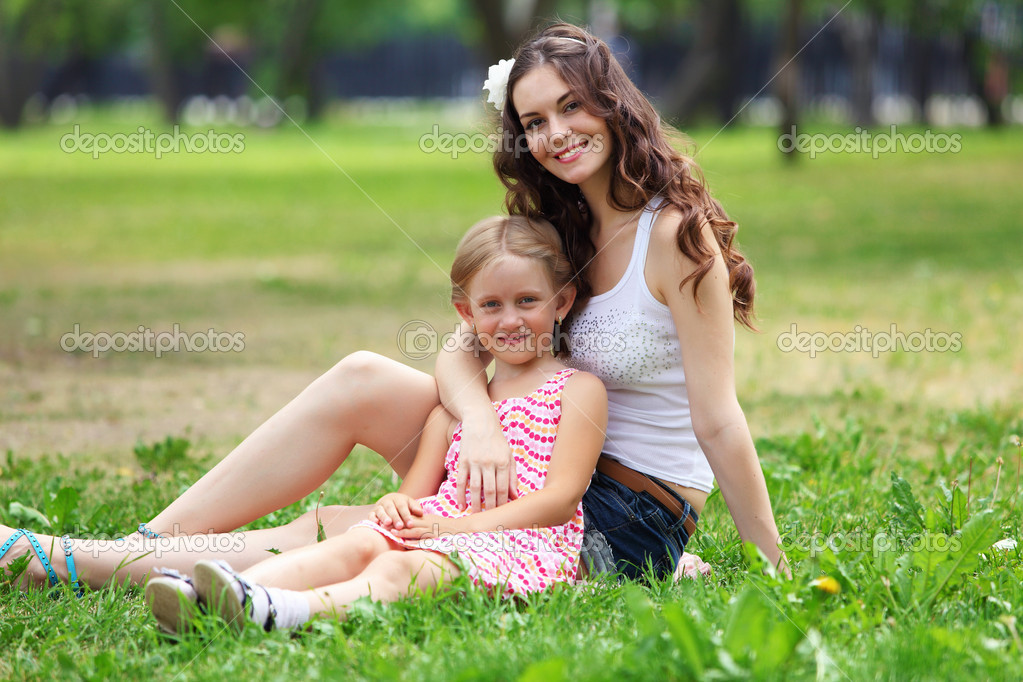 http://st.depositphotos.com/1000423/1434/i/950/depositphotos_14343387-Mother-and-daughter-in-the-park.jpg
