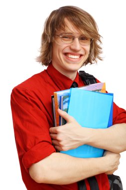 Kitaplar ile mutlu öğrenci