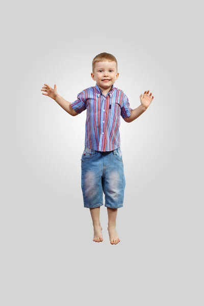 Šťastné dítě skákání — Stock fotografie