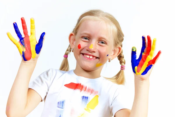 Criança feliz com tinta nas mãos — Fotografia de Stock