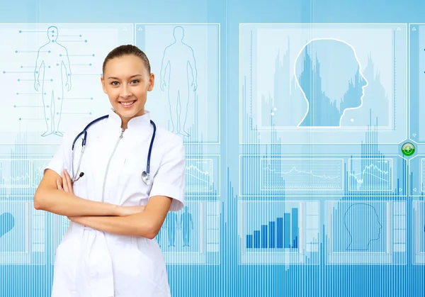 Młody lekarz w biały uniform tle technologii — Zdjęcie stockowe