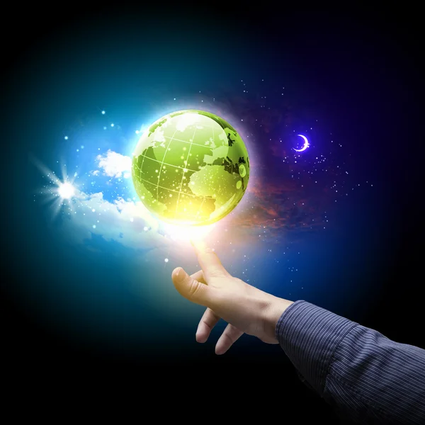 Hand touching the earth — Stock Photo, Image