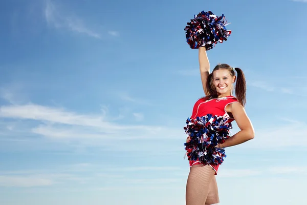 Młoda kobieta cheerleaderka — Zdjęcie stockowe