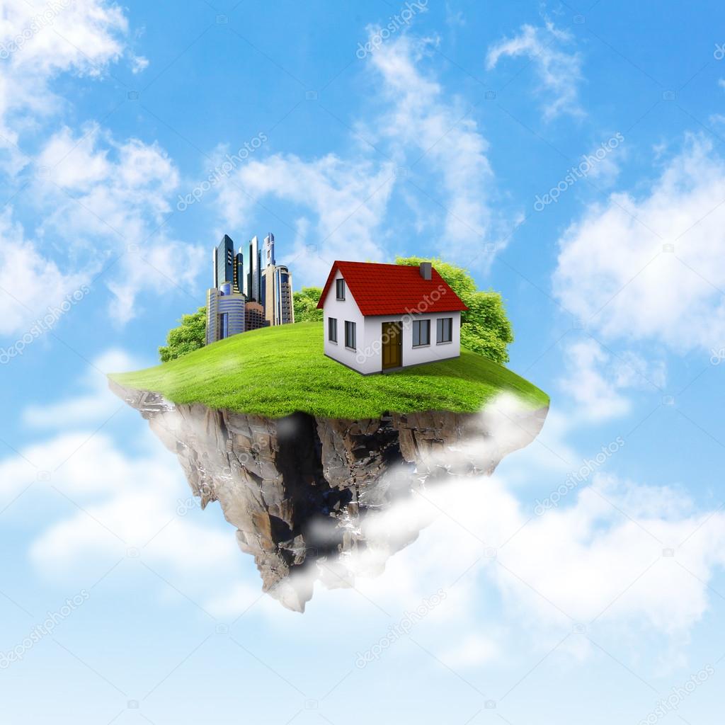 A piece of land in the air with house and tree.