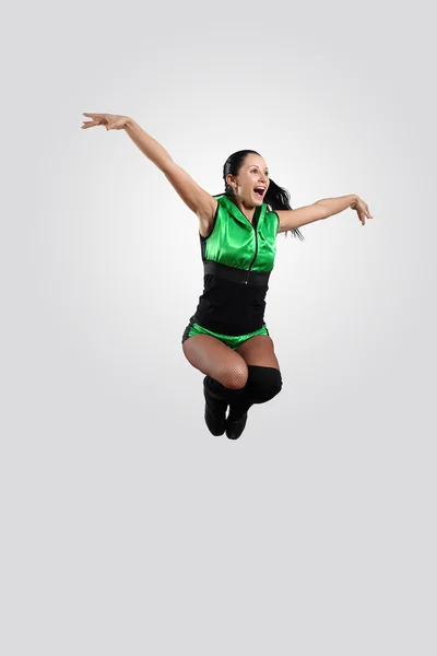 Young female dancer against white background — Stock Photo, Image