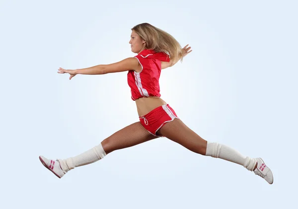 Cheerleader girl jumping — Stock Photo, Image