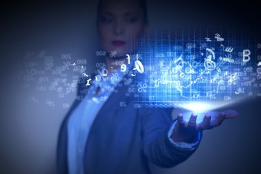iş kadını ile finansal simgeler