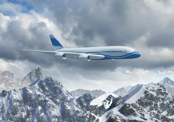 White passenger plane above the mountains — Stock Photo, Image