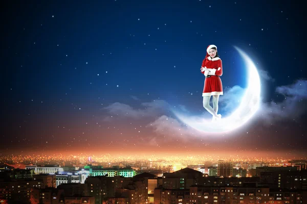 Santa girl on the moon — Stock Photo, Image