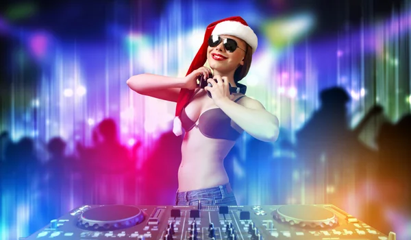 Female dj in christmas wear — Stock Photo, Image