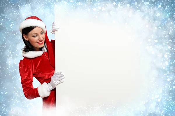 Santa girl with a blank banner — Stock Photo, Image