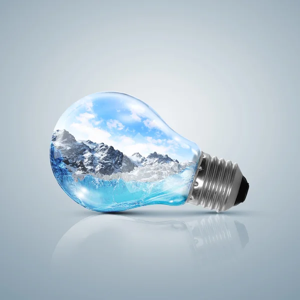 Lamp bulb with clean nature symbol inside — Stock Photo, Image