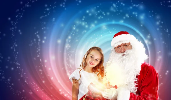 Ritratto di Babbo Natale con una ragazza Immagini Stock Royalty Free