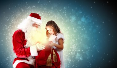 Portrait of santa claus with a girl clipart