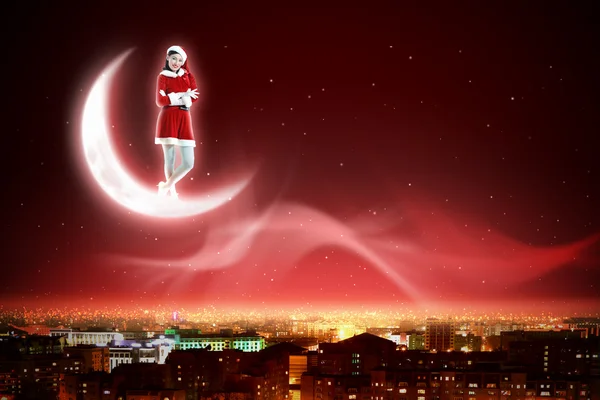 Santa girl on the moon — Stock Photo, Image