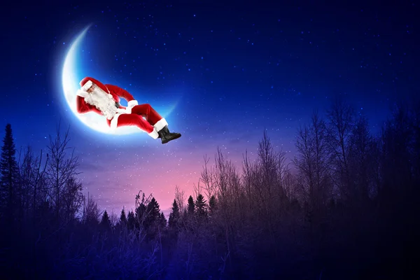 달에 산타 클로스의 사진 — 스톡 사진