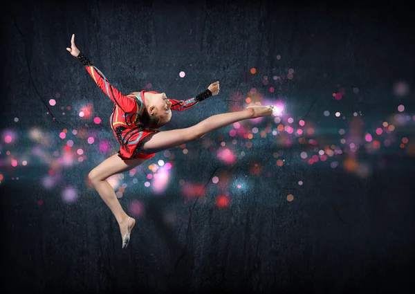 Young woman in gymnast suit posing — Stock Photo, Image